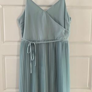 Dress with pleated bottom